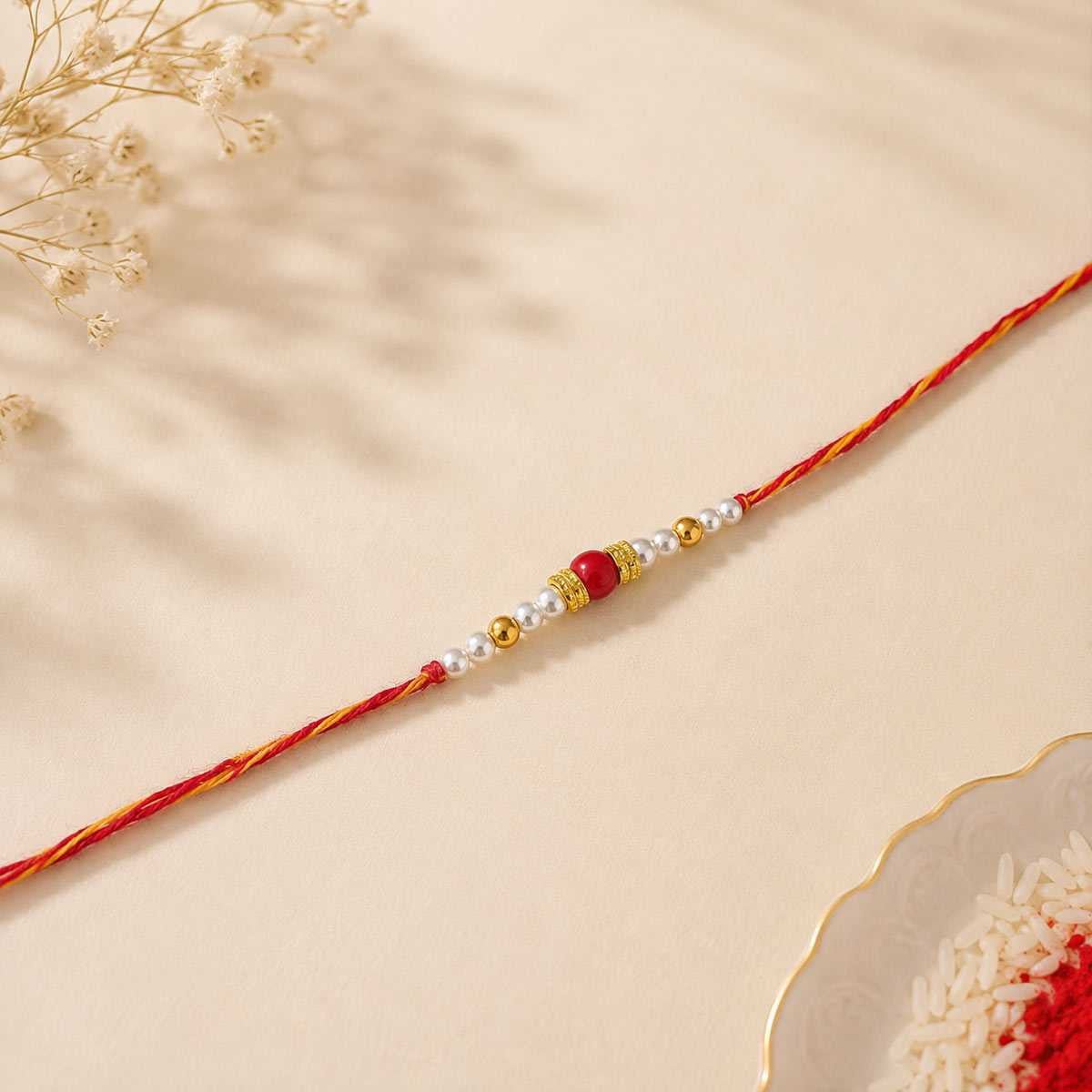 Classic Red Bead Rakhi with Pearls - Flowers to Nepal - FTN