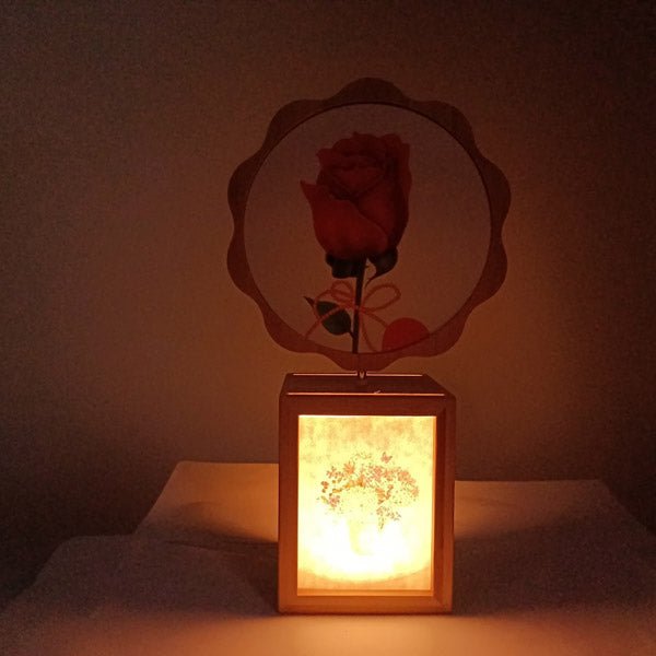 
                  
                    Elegant Rotating Floral Frame with LED Base Lamp - Flowers to Nepal - FTN
                  
                