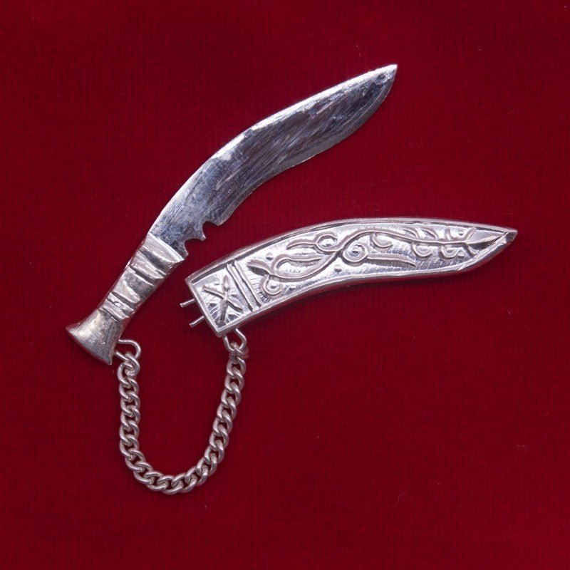 
                  
                    Elegant Silver Khukuri Pin - Flowers to Nepal - FTN
                  
                