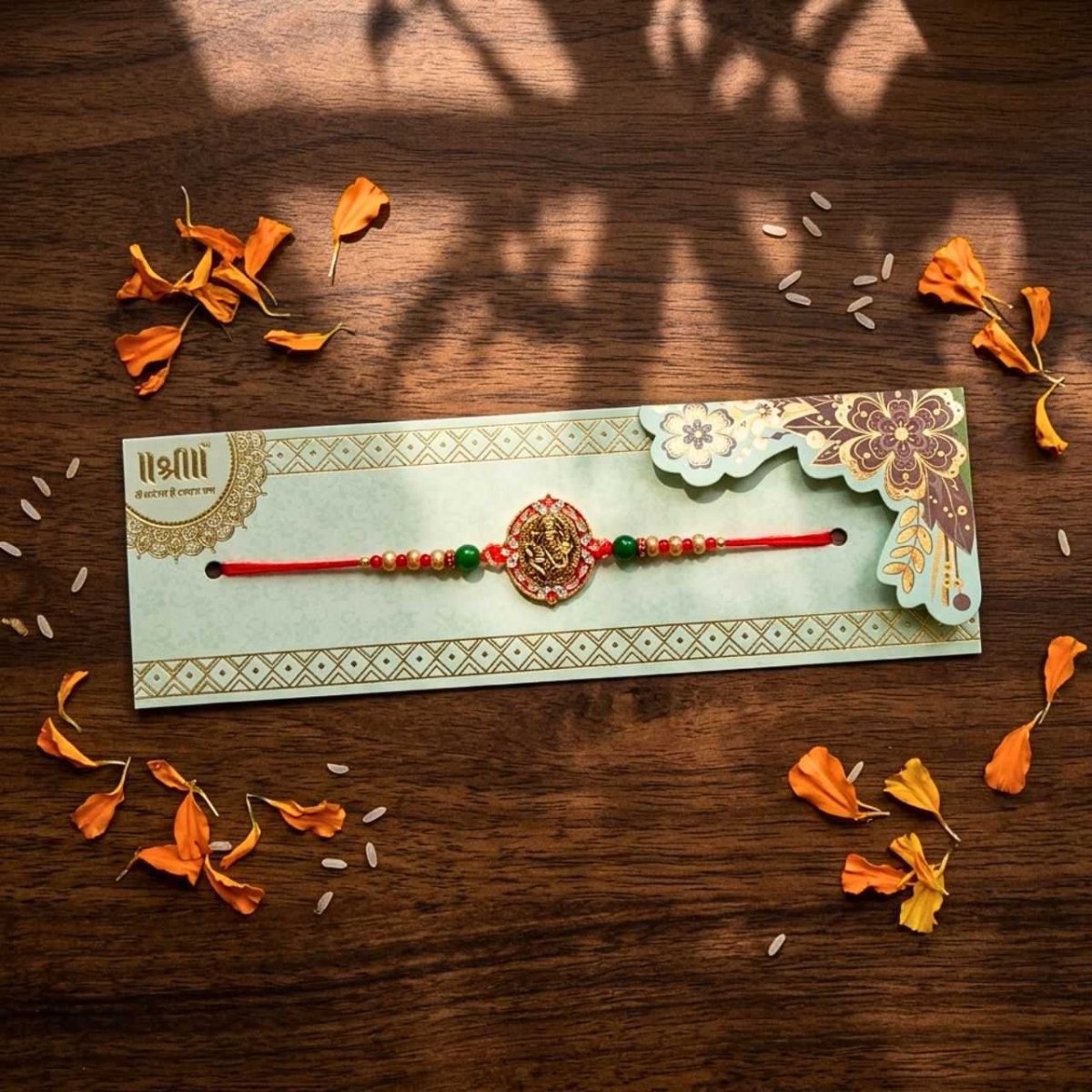 Ganpati Charm Rakhi for Brother - Flowers to Nepal - FTN