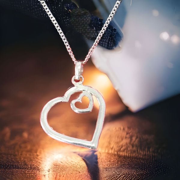 
                  
                    Silver Double Heart Pendant Necklace - Flowers to Nepal - FTN
                  
                