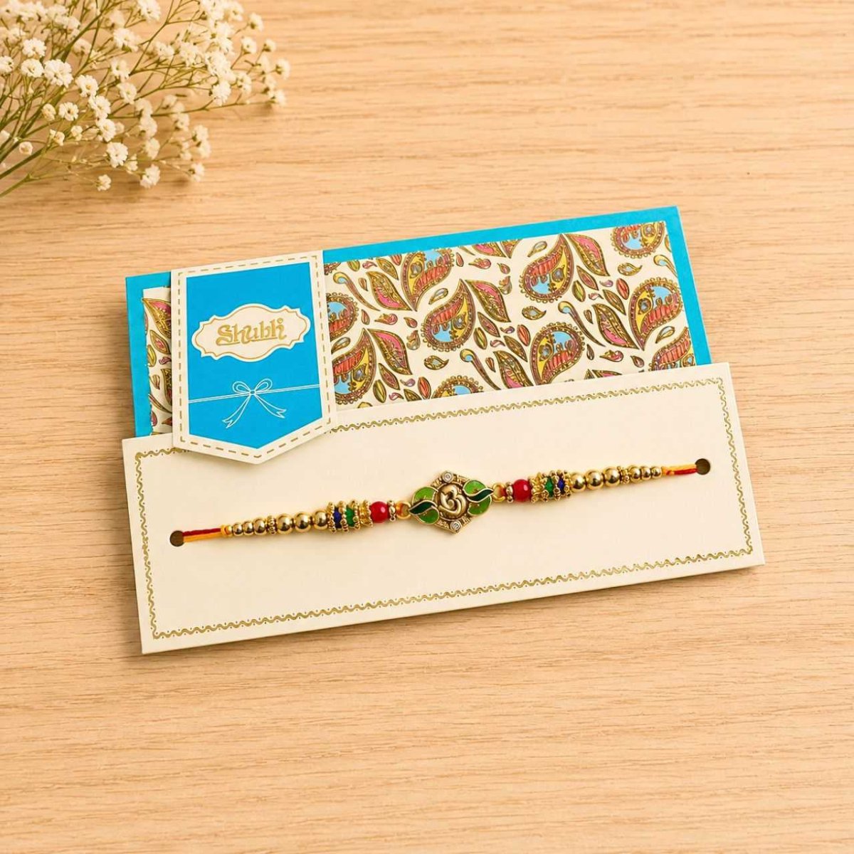 Traditional Om Beads Rakhi - Flowers to Nepal - FTN