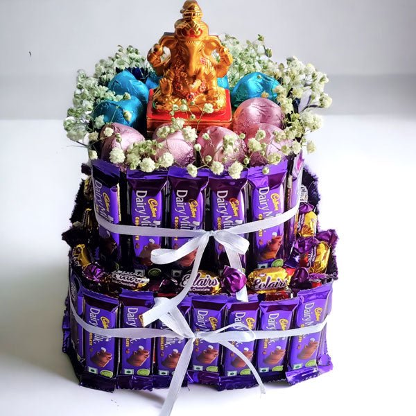 Dairy-milk Bouquet with Ganesha & Eclairs Sameday Delivery In Nepal - Flowers to Nepal - FTN