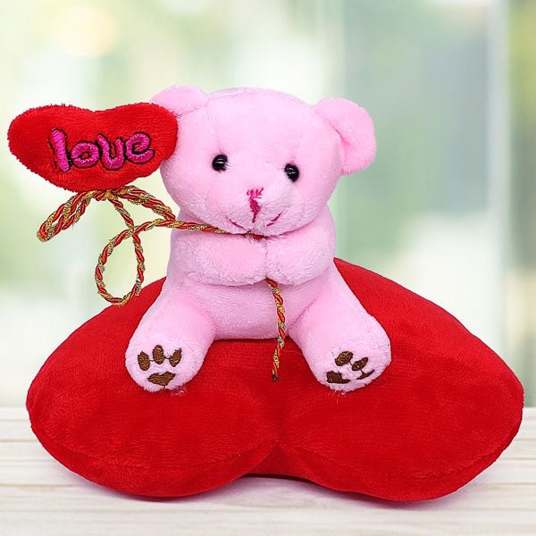 Pink Teddy Bear Adorably Seated on a Red Heart Cushion - Flowers to Nepal - FTN